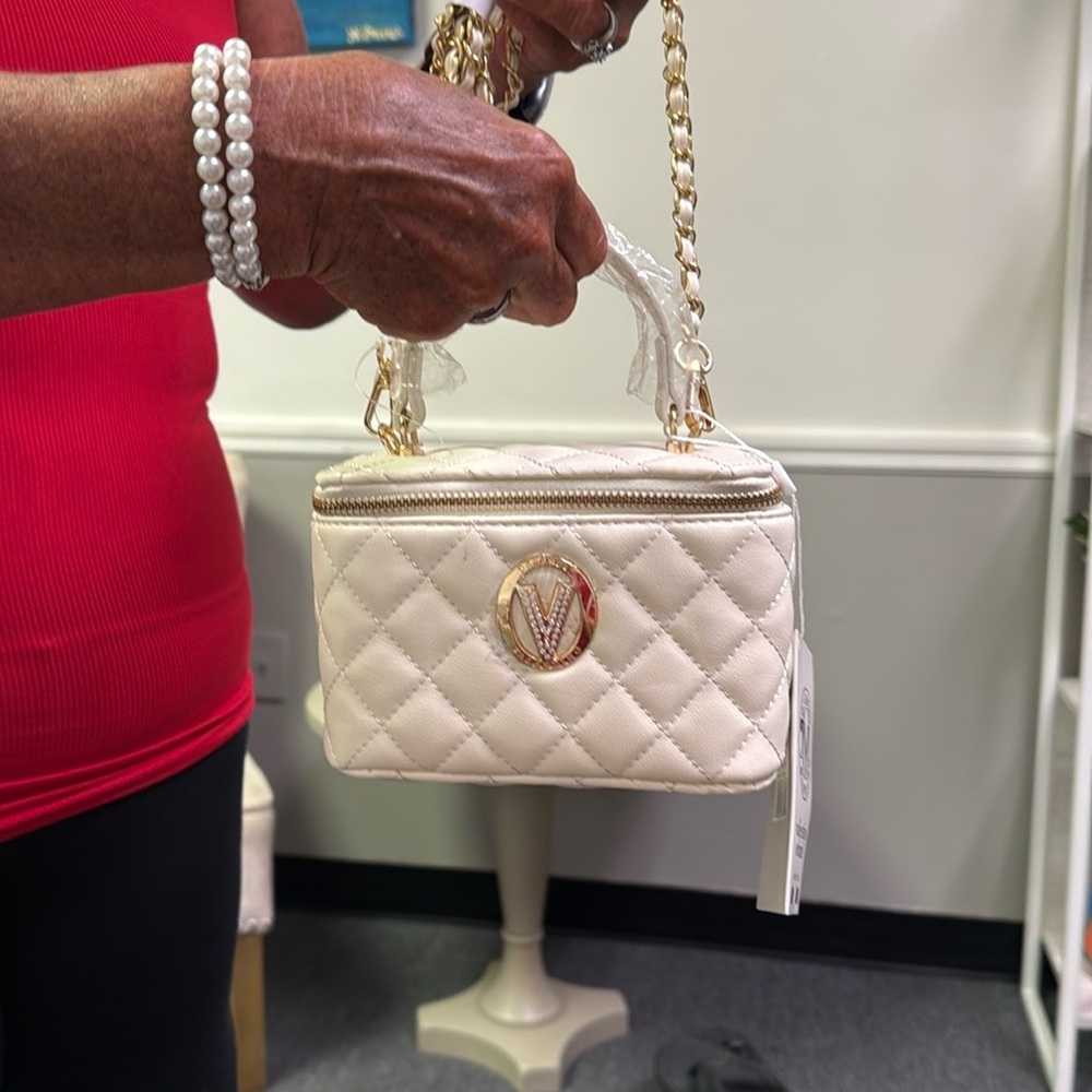 Valentino Orlandi Cream and Gold Mini Bag with Quilted Design
$99.00 TODAY ONLY - Picture 8 of 14